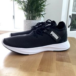 NWOT Puma Radiate XT sneakers. These sneakers have never been worn.